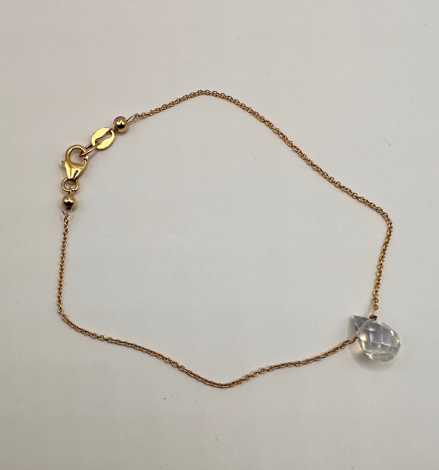 14kt Gold Filled with a Faceted Opalescent Swarovski Briolette Bead Bracelet