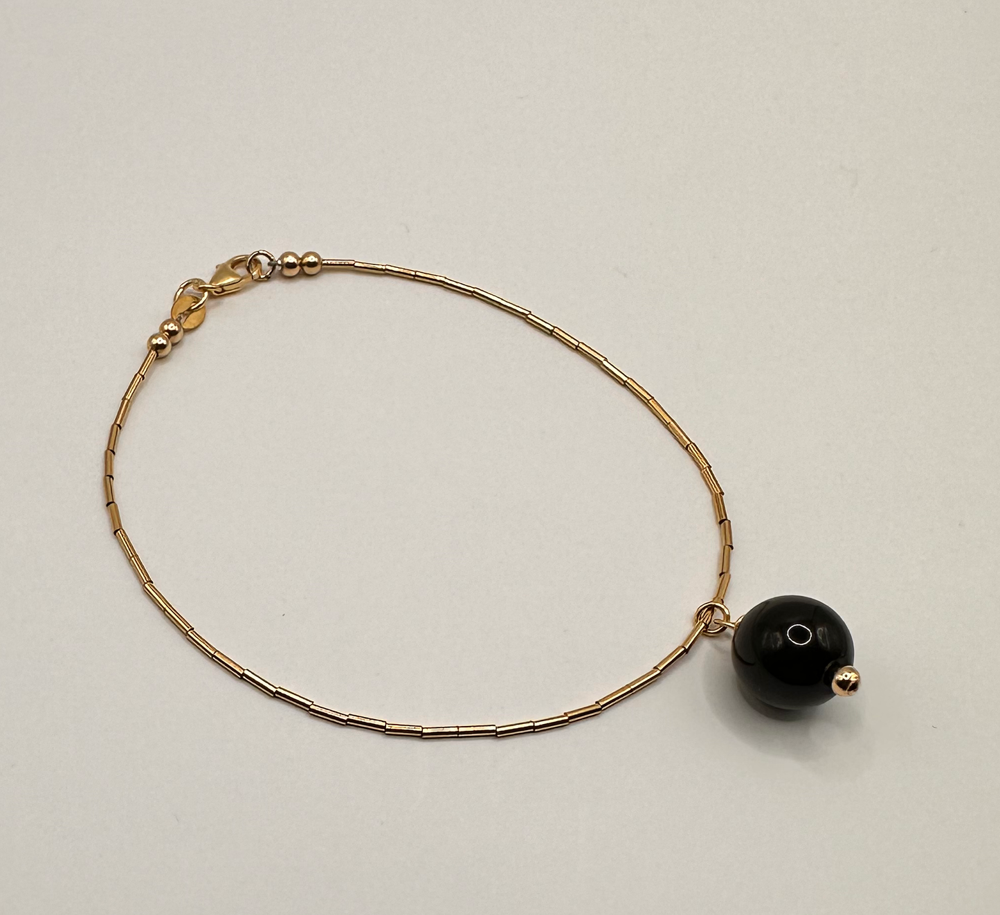 Beautiful 14kt Gold Filled with a Accent Black Onyx Bead Bracelet
