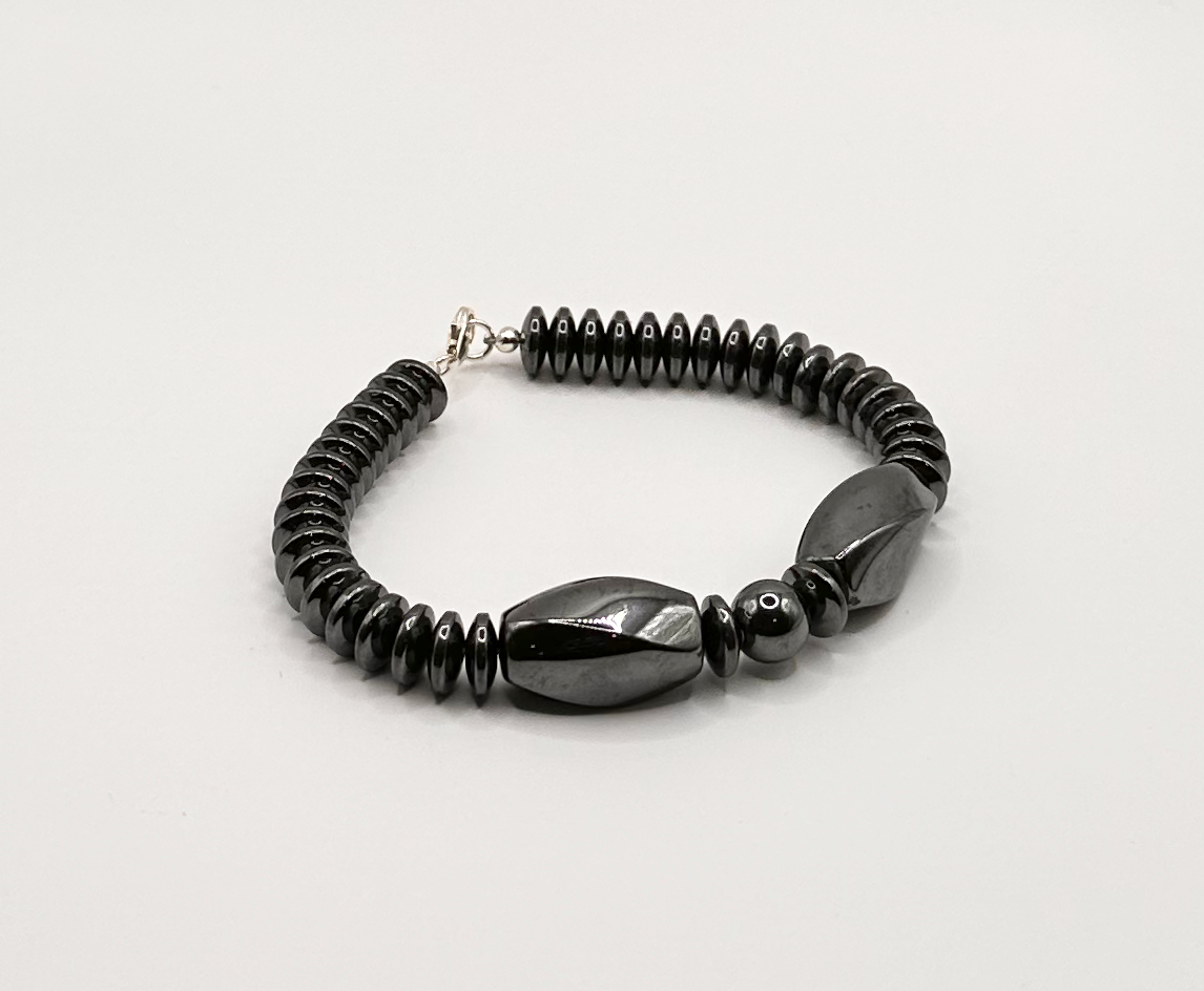Hematite Bead Bracelet with Swirl Cut Accent Beads
