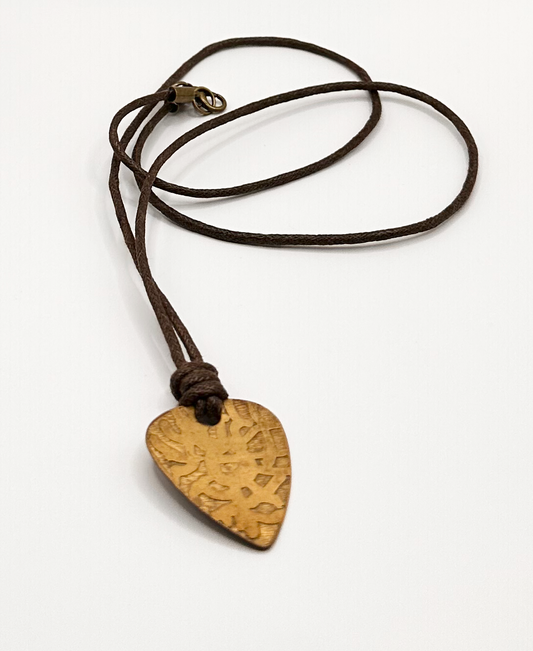 Contemporary Brass Etched Design Guitar Pick Pendant on a Cotton Cord